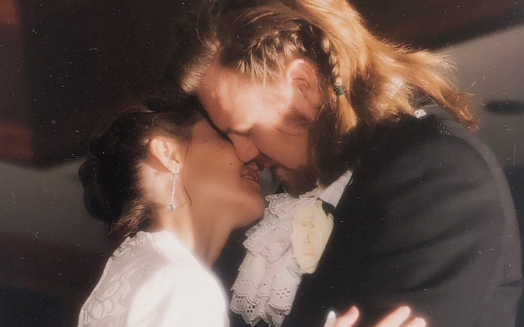 Close up of me and my husband dancing at our wedding, a quarter century ago